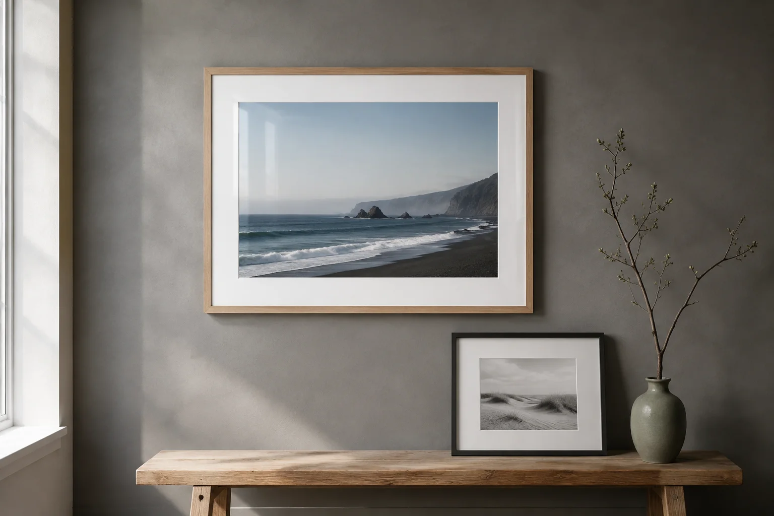 AI-generated interior concept with oak and charcoal framed coastal photographs